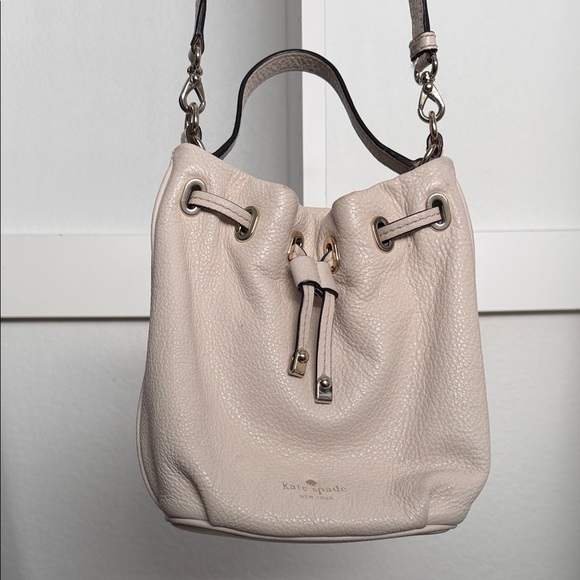 kate spade Handbags - Kate Spade Pebbled Leather Drawstring Bucket Bag in Light Beige/White